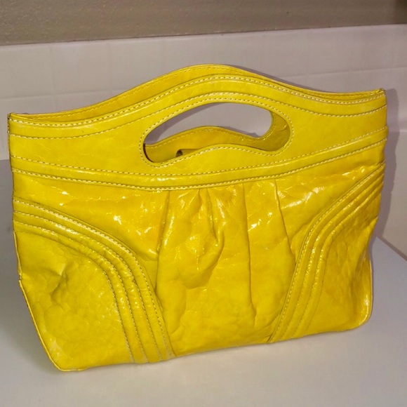 large yellow clutch bag
